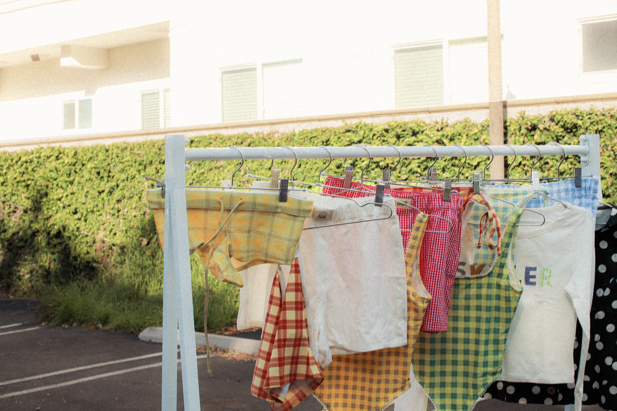Gingham and plaid pieces on the clothing rack