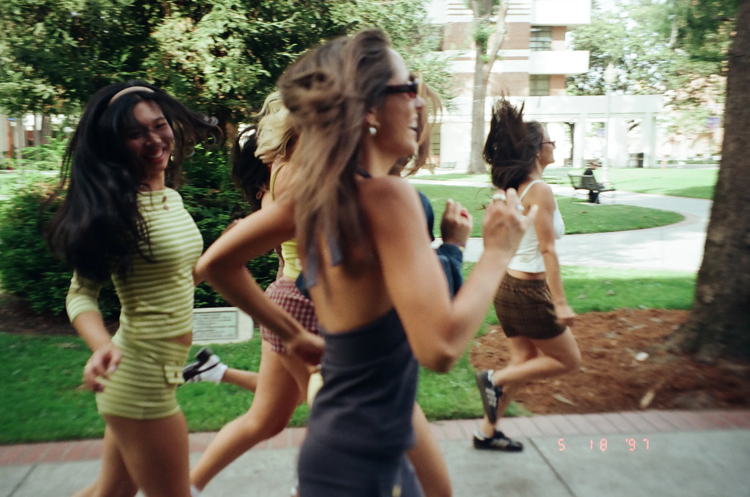 Models running and laughing