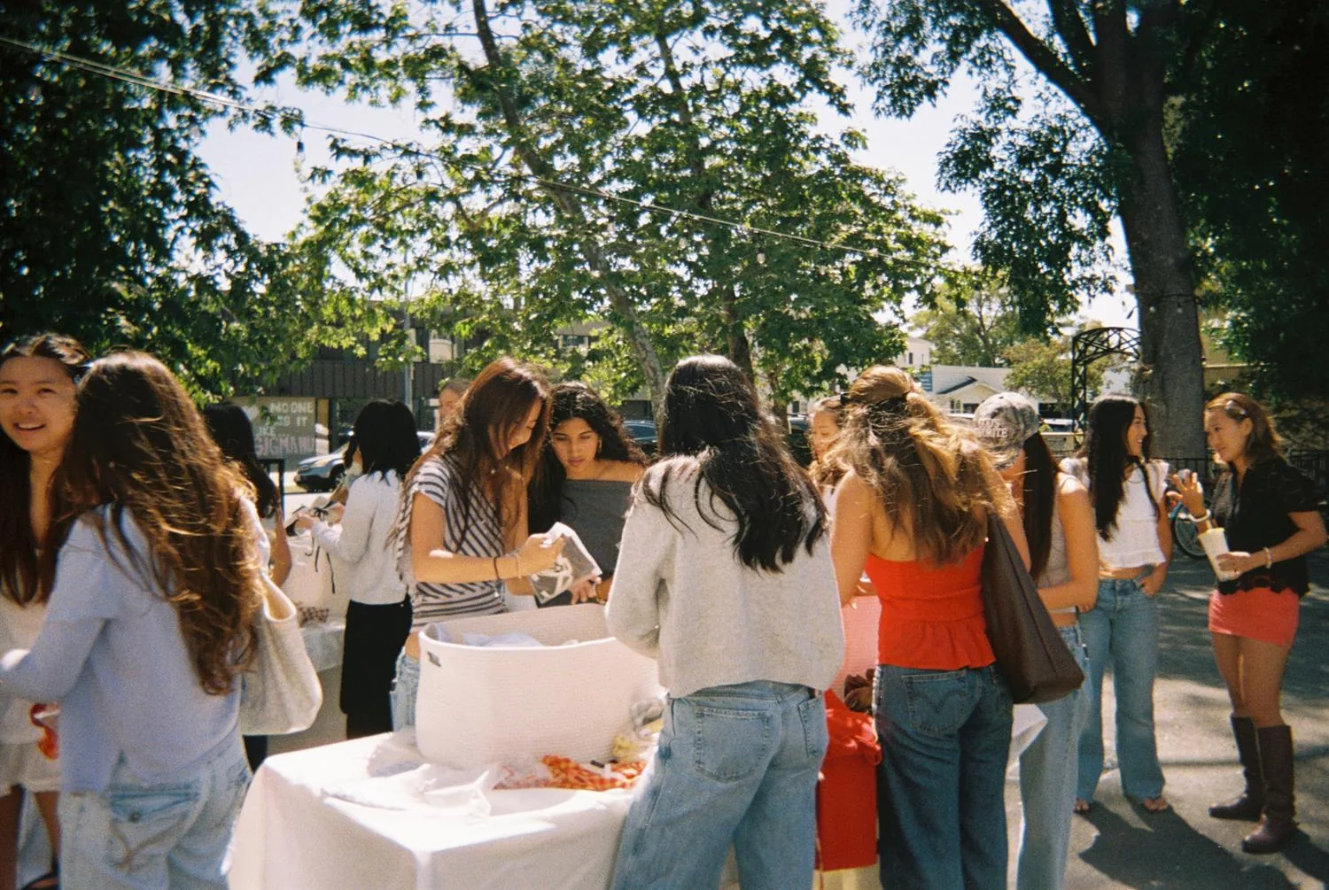 Guests gathered around the sample sale display